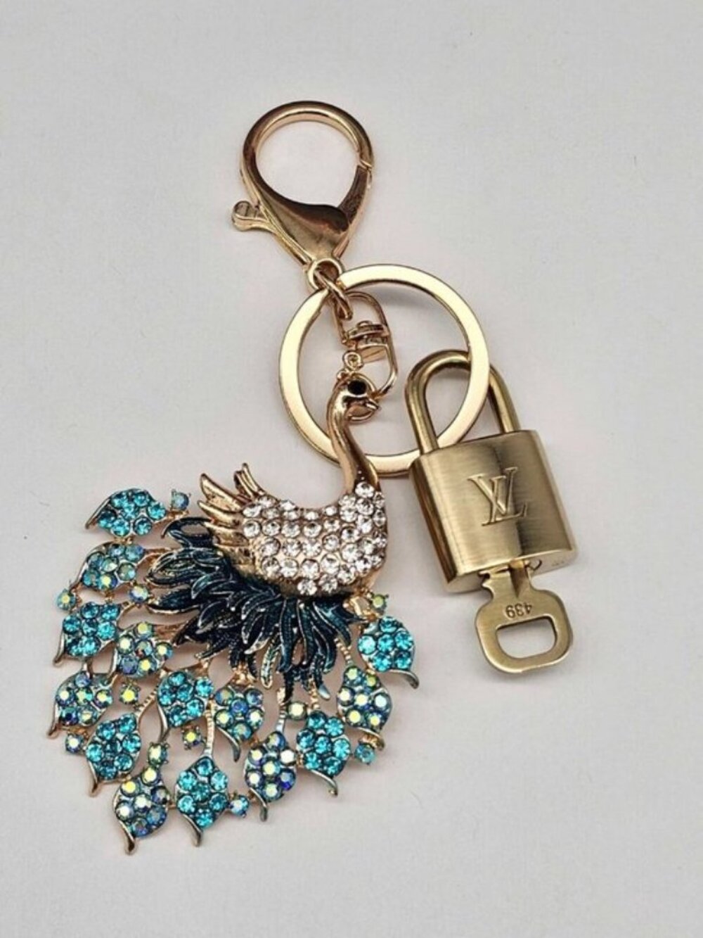 Authentic Louis Vuitton Gold Lock 🔒 Unbranded Peacock Keychain Bag Charm LV - Picture 9 of 9